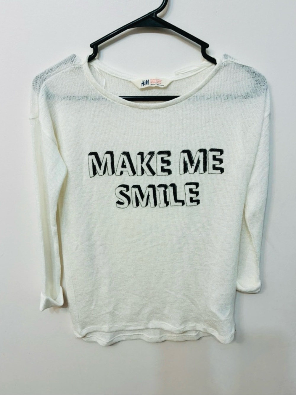 H&M White Long Sleeve Top with 'MAKE ME SMILE' Black Text